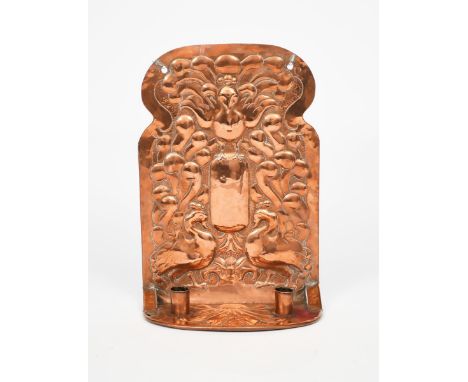 A twin-light copper wall sconce,  shaped rectangular back-plate stamped in low relief with three peacock birds, the two sconc