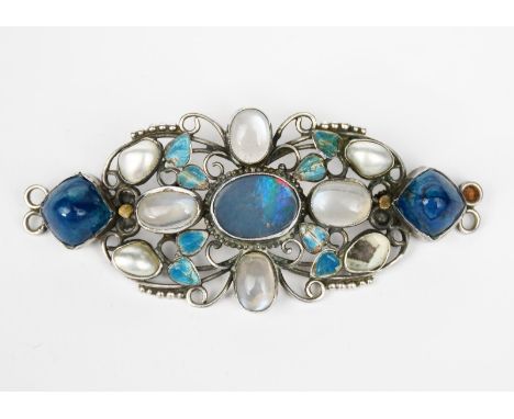 A fine George Hunt silver and enamel bar brooch, wirework frame with blue enamelled leaves, set with lapis moonstone and opal