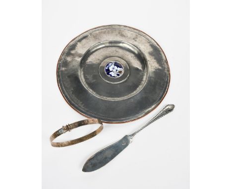 A George Hunt silver fish knife, the handle engraved with a simple torch motif, a silver bangle and a pewter plate enamelled 
