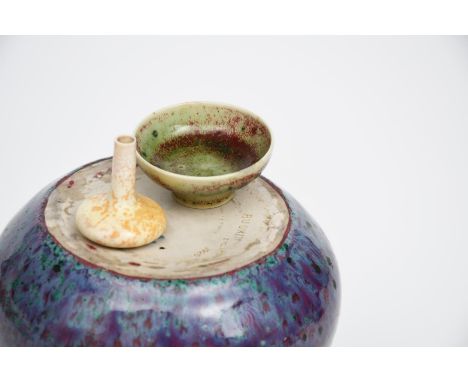 A rare Ruskin Pottery miniature vase by William Howson Taylor, compressed form with cylindrical neck, covered in a speckled o