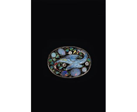 An impressive George Hunt silver, enamel and pearl set brooch, the pierced oval frame enamelled with a large exotic bird perc