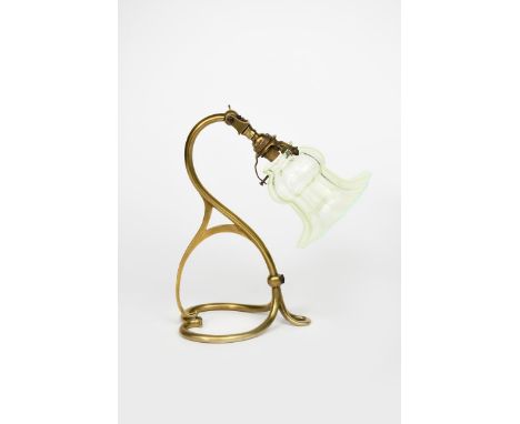 A W A S Benson brass wall/table lamp,  with heart-shaped base, elaborate scrolling stem and articulated fitting, vaseline gla