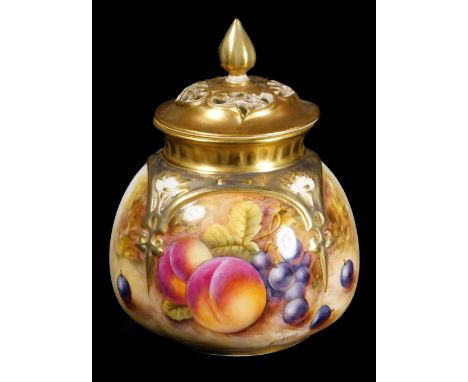 A 20thC Royal Worcester porcelain potpourri jar and cover, by Nigel Creed, handpainted with autumnal fruits to include peache