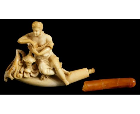 A late 19thC carved meerschaum pipe, with amber stem formed as a lady, 13cm W. 