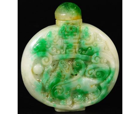 A jade type snuff bottle, of oval form, with compressed dropper, carved to each side, on oval foot, 6.5cm H.