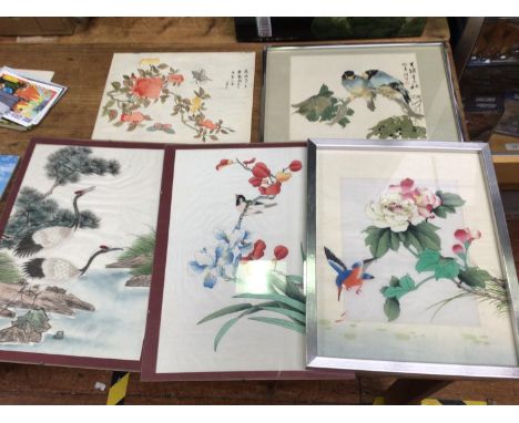 Three various Oriental hand painted silks, together with an Oriental watercolour and a print, decorated with birds and flower