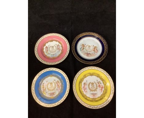 A set of four Sevres porcelain cabinet plates baring the crowned monogram of King Louis Philippe I of France, within laurel w