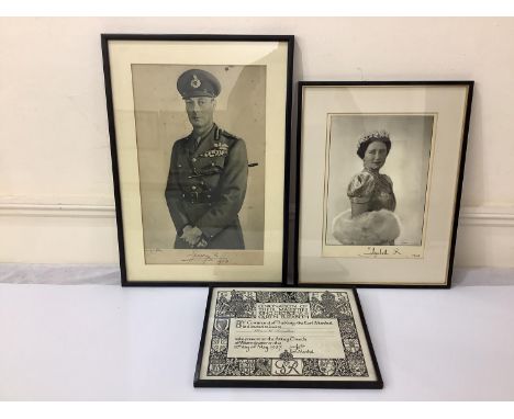 A three quarter-length monochrome photograph of King George VI in military uniform, signed 'George R 1950,' 36x23cm, together