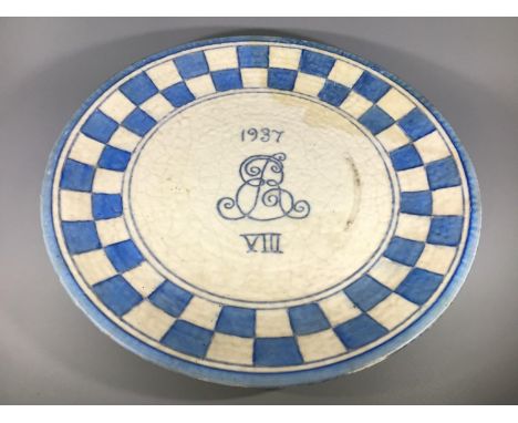 A Crown Ducal pottery royal commemorative charger by Charlotte Rhead, with blue and white chequered border and '1937 ER VIII'