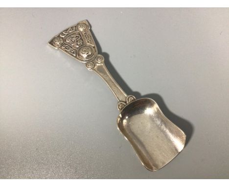 An Alexander Ritchie of Iona Silver Caddy Spoon, early 20th century, the handle cast with Celtic motifs, the back marked 'AR,