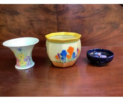 A small moorcroft dish, together with a crocus hand painted bowl from the Bizarre range by Clarice Cliff and a miniature vase