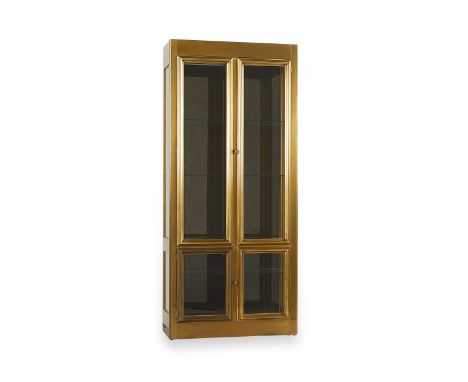 MasterCraft, United States. A brass and glass display cabinet or vitrine with smoked glass back, one of two in this auction. 