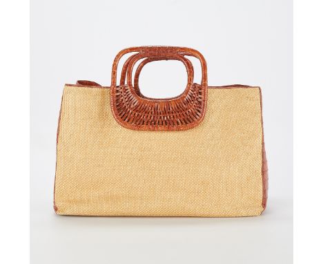 Nancy Gonzalez, New York and Columbia. Natural raffia and genuine crocodile leather tote handbag. The handles, side panels, b