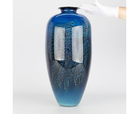 Josh Simpson (American, b. 1949). Large art glass vase in shades of blue. Signed along the underside. The undulating shades o