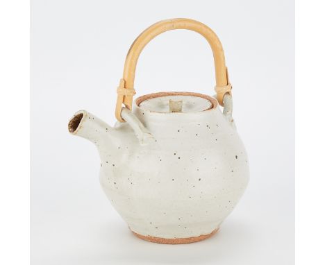 Warren MacKenzie (American, 1924-2018). Studio pottery ceramic teapot with wooden handle. Oatmeal glaze stoneware. Stamped al