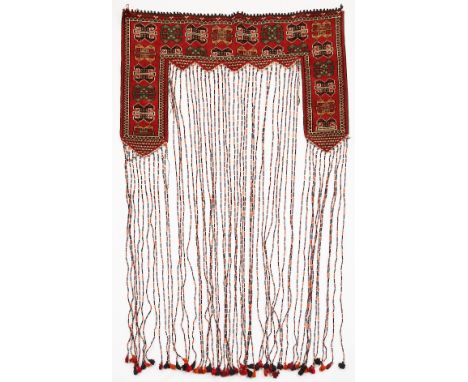 Middle Eastern or Turkish kapanuk wool hanging wall rug with long tasseled fringes meant for a tent or yurt door.Provenance: 