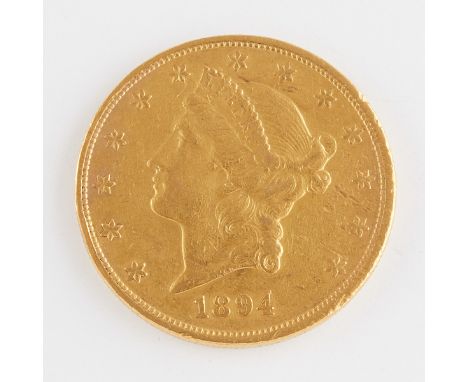 One 1894-P twenty dollar gold coin featuring on the obverse the bust of Lady Liberty encircled by 13 stars with the year belo