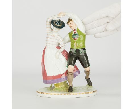 Hans Schwegerle for KPM, Germany. A porcelain figural group titled "Dancing Peasants" depicting a pair of traditionally dress