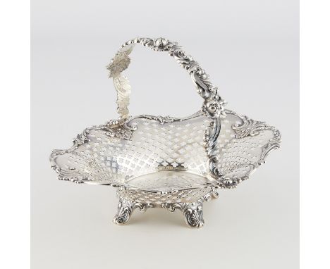 Tiffany &amp; Co., United States. Sterling silver handled basket, 1903. With pierced decoration along the body. The rim, feet