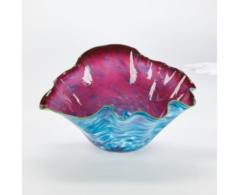 Dale Chihuly (b. 1941). Large handblown undulating glass bowl, 1993. The interior in hot pink and the exterior in turquoise b