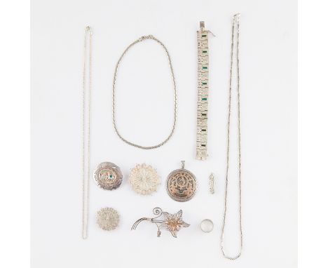 Group of 11 sterling silver and silver jewelry including: one 800 silver Guatemalan circular pendant with Mayan motifs, marke