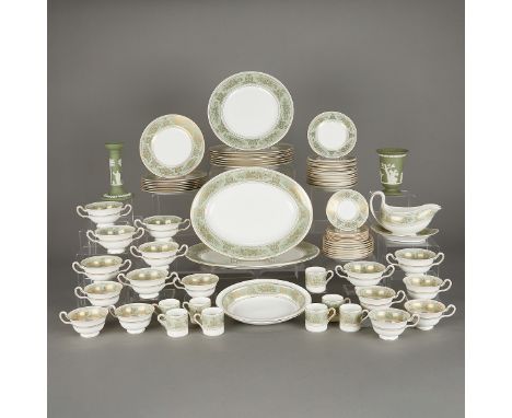 Wedgwood, England. Set of 79 serving ware. 77 pieces on the pattern "Gold Columbia" with a sage green border. The set include