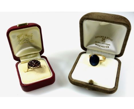 Swedish yellow metal adjustable ring set butterfly cabochon, by MKR, stamped 585, 3.8 grams and a 9ct garnet cluster ring, 2.