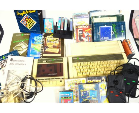 Acorn Electron computer game console, Acorn Electron cassette player/recorder, Voltmace joysticks, and games cassettes to inc