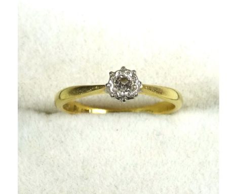 18ct gold solitaire illusion set diamond ring, 0.064 carat diamonds, size O 1/2, 2.7 grams, boxed (2) 