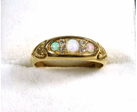 18ct gold dress ring set opals and diamonds, size Q 1/2, 4.2 grams 