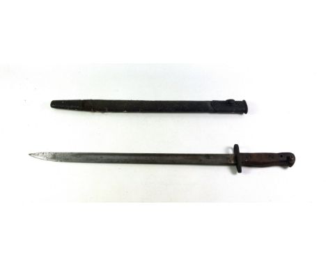 First World War bayonet with a double fullered blade inscribed "Wilkinson" with numbers, L.55.5cm, in a leather scabbard. (2)