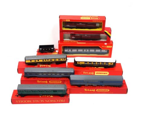 7 Tri-ang Hornby coaches, R.339, R.325, R.446, R.329, R.228, R.225, and R.102, and 2 wagons, R.738, all boxed. (9) 
