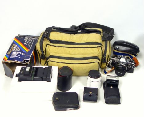 Olympus OM10 with 3 lenses, manual adaptor, flashgun and extension tubes, tripod and numerous out of date film - all items un