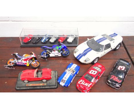 Motor Max 1:12 scale diecast model of a Ford GT, 2 Chevrolet NASCARs, one as a moneybox; 2 Maisto Motorbikes and a Cobra 427,