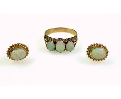 9ct gold opal trio ring, size R, 4.3 grams, and a pair of 9ct gold earrings set opal, 1.7 grams (3) 