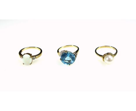 9ct gold ring set opal and 2 brilliants, 9ct ring set cultured pearl, and a 9ct ring set blue stone and brilliants, 10.6grs. 