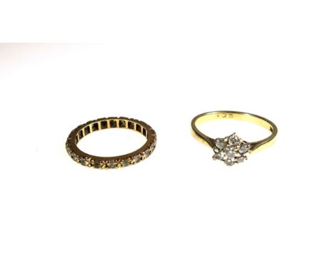 9ct gold diamond cluster ring set seven diamonds, 0.25 carat approx., ring size O 1/2, 2.1 grams, and a yellow metal ring set