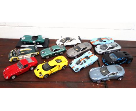 Twelve 1:18 scale diecast models of sports cars, including Burago Ferrari GTO and Bugatti Chiron; Maist, Mondo Motors, Univer