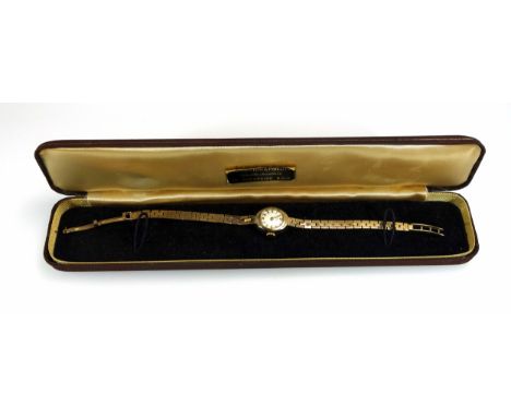 Vertex Revue ladies 9ct gold bracelet watch with a circular dial enclosing a Swiss side-wind movement, in an A L Dennison cas