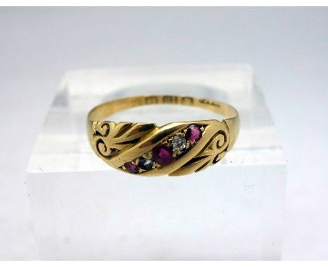 An 18ct gold, diamond and ruby ring, Birmingham 1901, weight 1.7g, size O