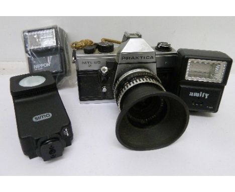 A Praktica MTL-50 film camera and flash guns