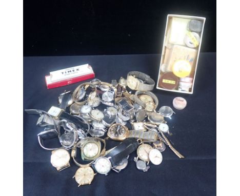 TIMEX: A QUANTITY OF LADIES' AND GENTLEMENS' WATCHES and Timex watch parts.