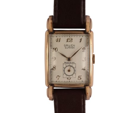 GRUEN CURVEX: A GENTLEMAN'S GOLD-PLATED WRISTWATCH with a manual wind movement, the rectangular white dial with gold Arabic n