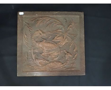 A VICTORIAN OAK SQUARE PANEL carved with a dragon 39 x 40cm. Provenance: Property of a Private Collector