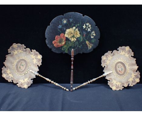 A VICTORIAN JENNENS &amp; BETTRIDGE PAPIERMACHE FACE SCREEN with turned handle, and a pair of giltwood and carton face screen
