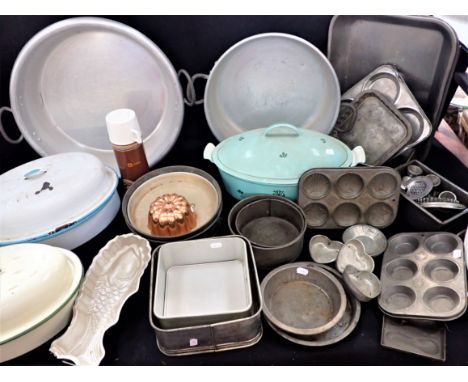 A COLLECTION OF KITCHENALIA including enamel roasting tins, baking tins, etc