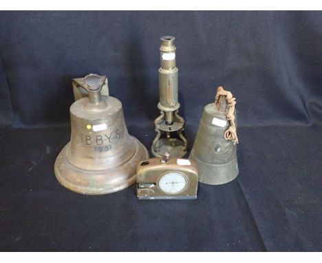 A WALL MOUNTED 'SCRAMBLE' STYLE BRASS BELL engraved 'Ibby's 1951', 20cm high (lacking clapper), a Continental brass bell, an 