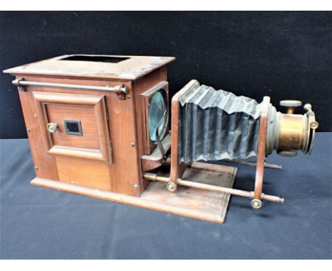 AN EDWARDIAN MAGIC LANTERN (for restoration) the lens cover stamped J.W. est. 1816, London made Rd.No.230577