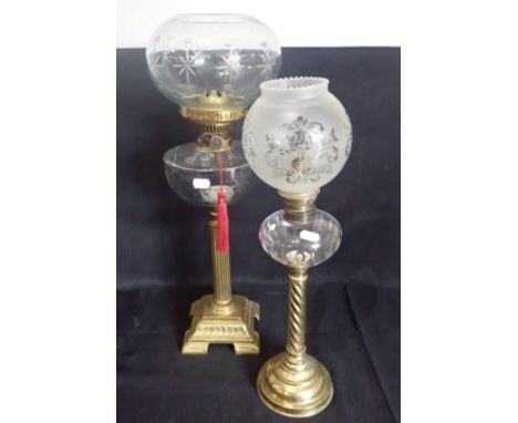 A 19TH CENTURY BRASS TABLE OIL LAMP with star cut glass reservoir, reeded column on moulded square base, with a matched shade