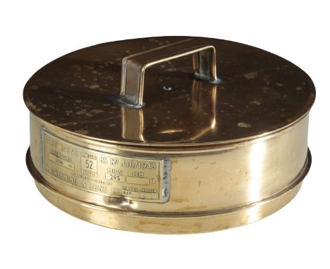 A BRASS LIDDED SIEVE of circular section, marked 'Test sieve BS No 410/1943', and 'Mesh 52 normal', and 'Aperture 0.116 in', 
